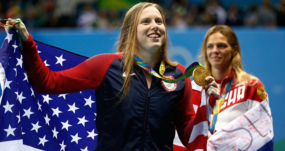 Former Sea Creature, Lilly King, celebrates her gold medal victory in the Women's 100m Breaststroke at the Rio Olympics in 2016